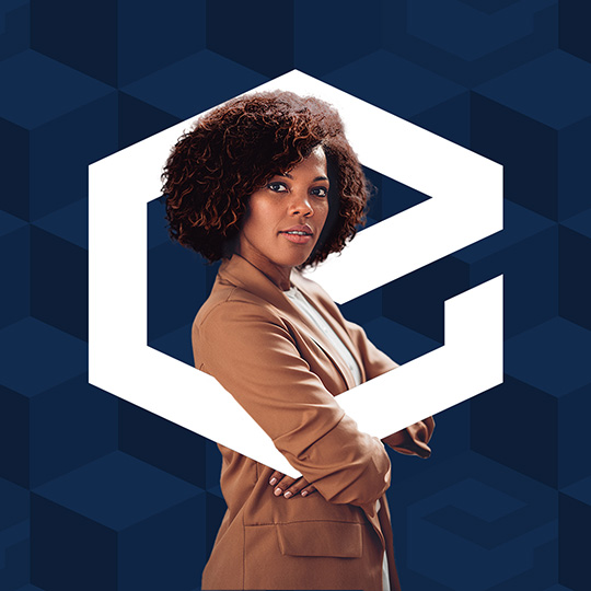 business woman standing in enigma logo